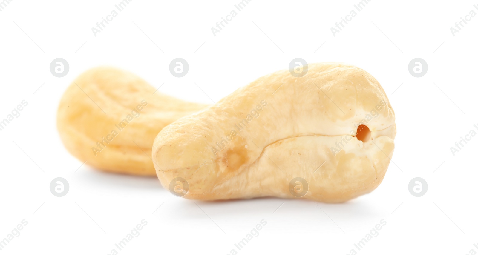 Photo of Tasty organic cashew nuts isolated on white