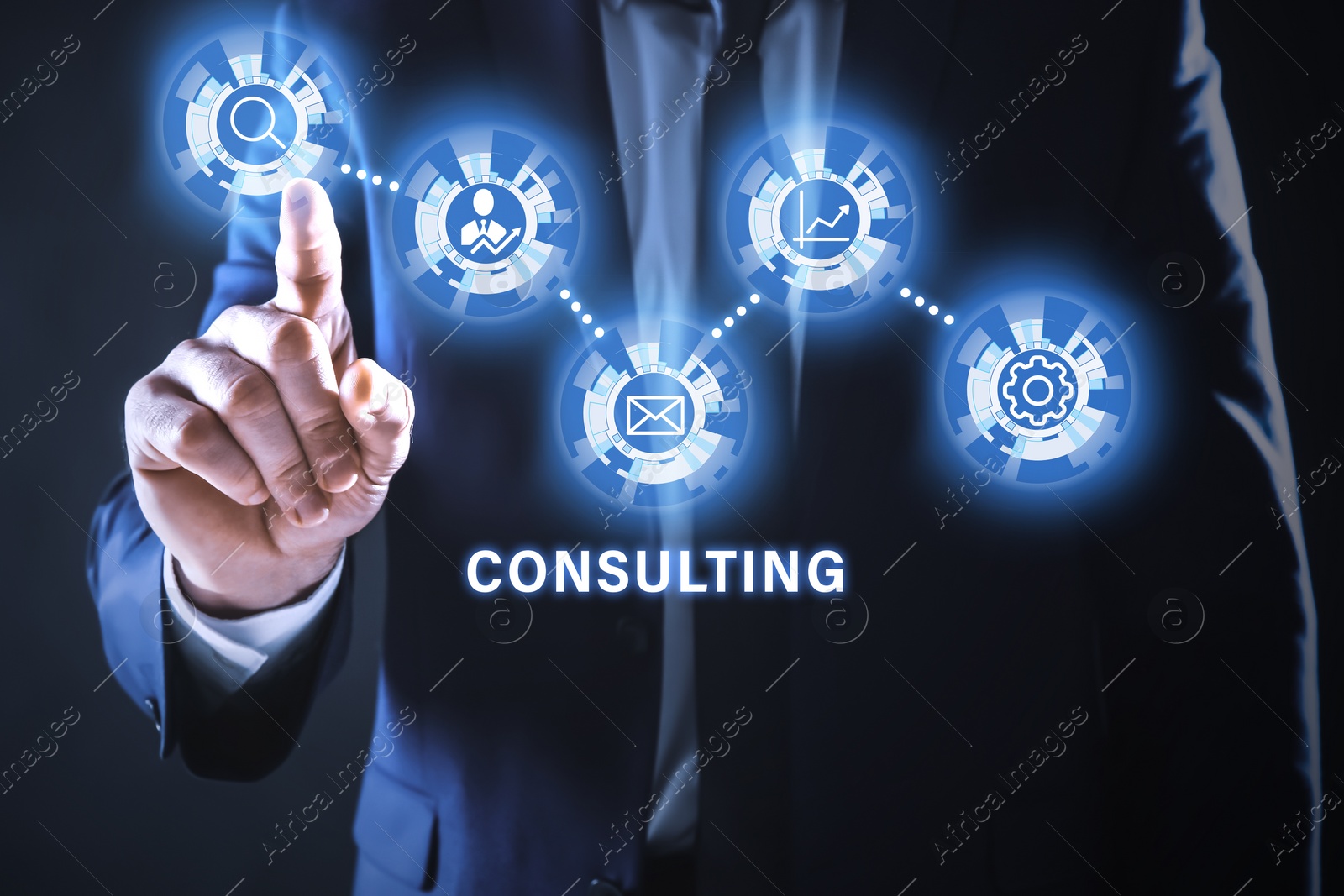 Image of Consulting concept. Businessman pointing on dark background, closeup