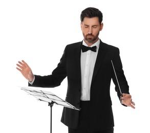 Professional conductor with baton and note stand on white background