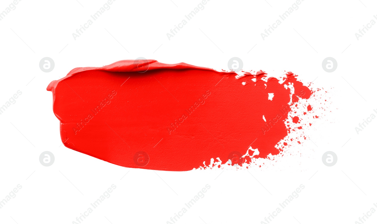 Photo of Red oil paint stroke on white background, top view