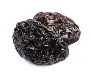 Sweet dried prunes on white background. Healthy snack