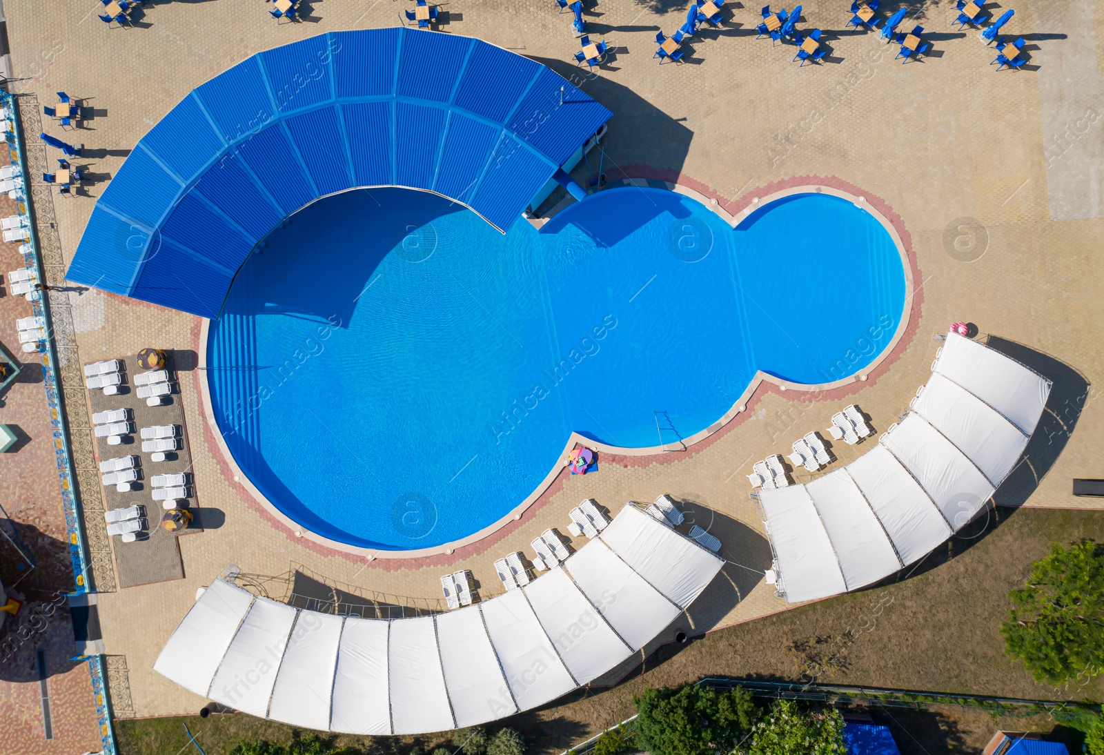 Image of Aerial view of swimming pool on sunny day