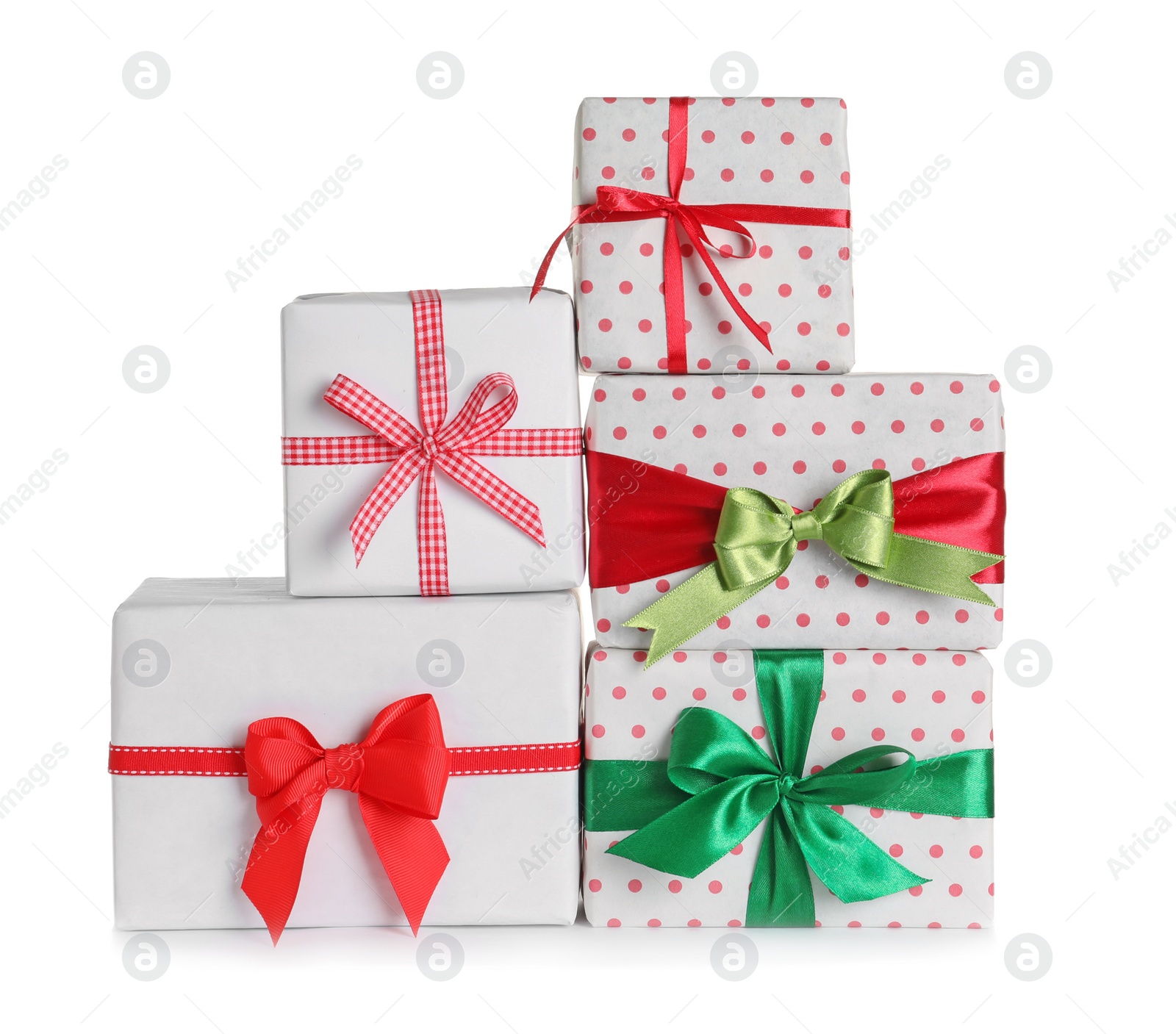 Photo of Beautifully wrapped gift boxes on white background