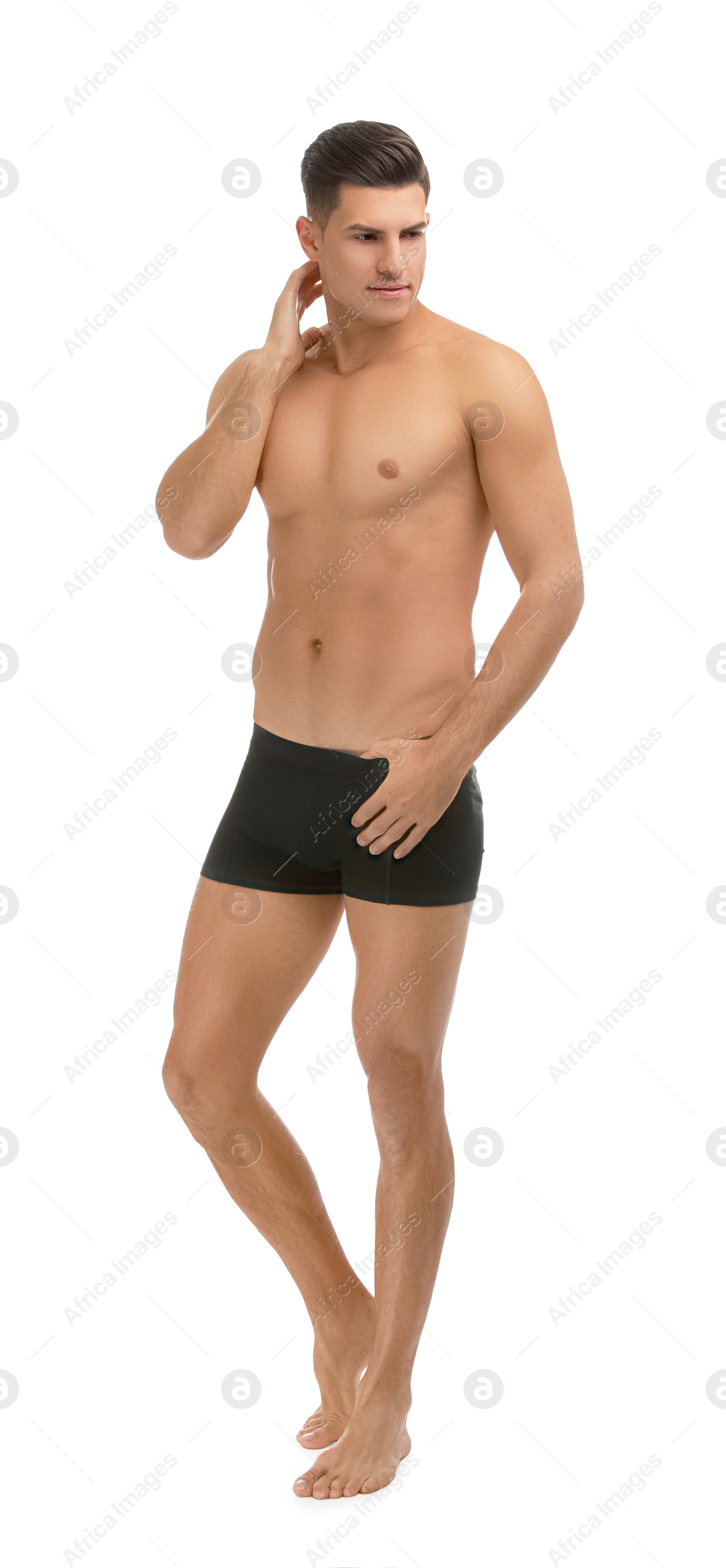 Photo of Handsome man in black underwear on white background