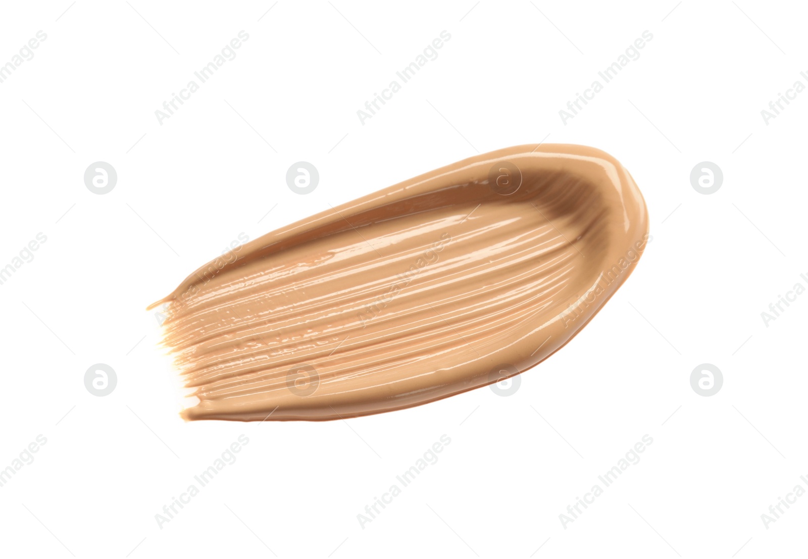 Photo of Smear of liquid skin foundation isolated on white, top view