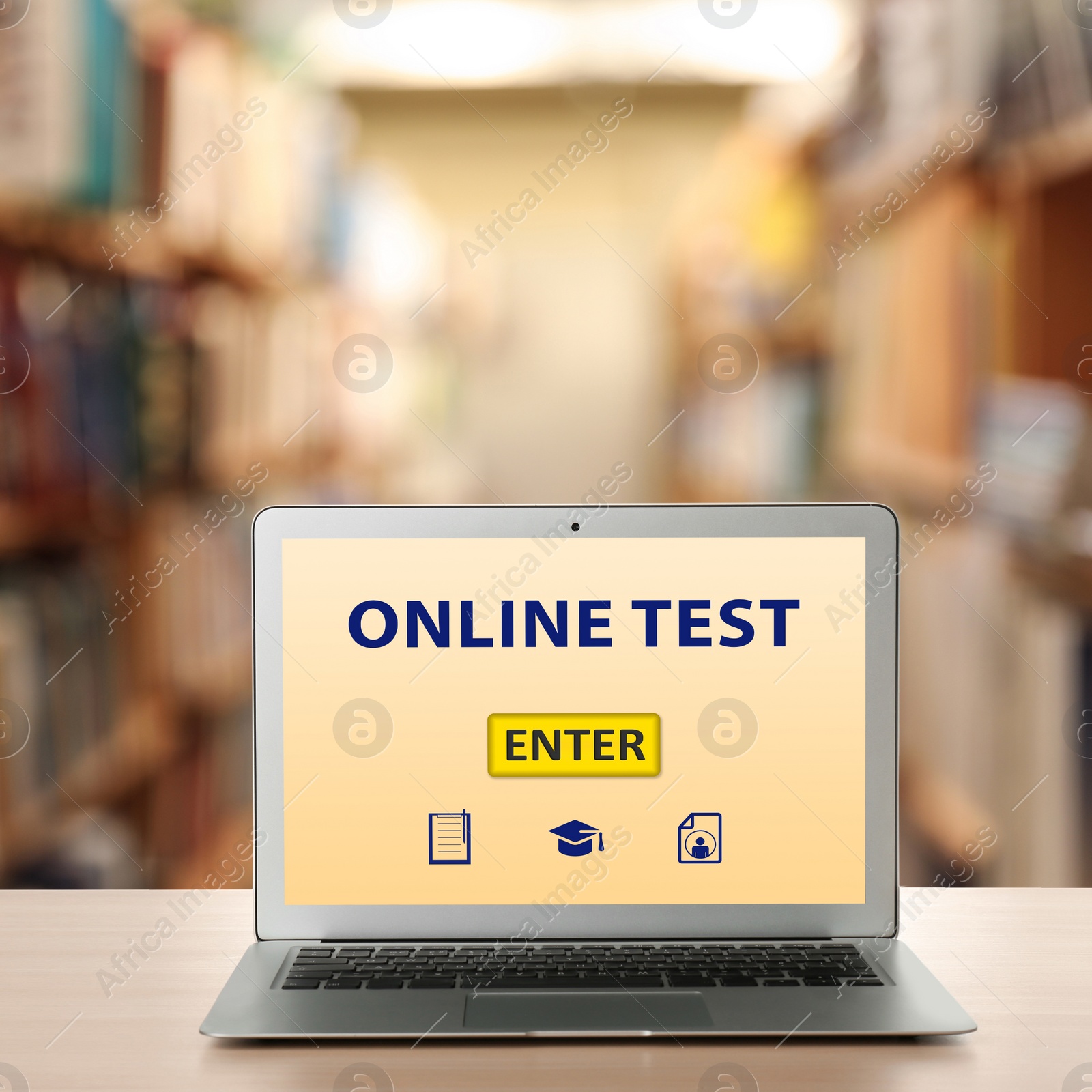 Image of Laptop with online test on screen in library