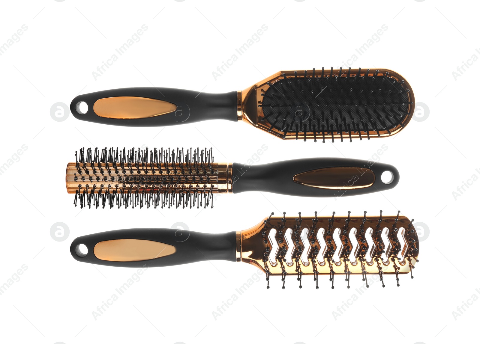 Photo of Set of professional hair brushes isolated on white, top view