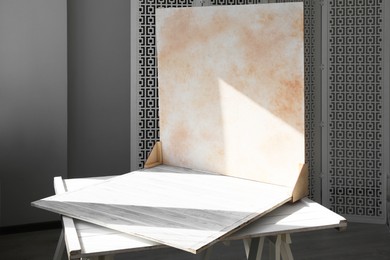 Photo of Double-sided backdrop on table in photo studio