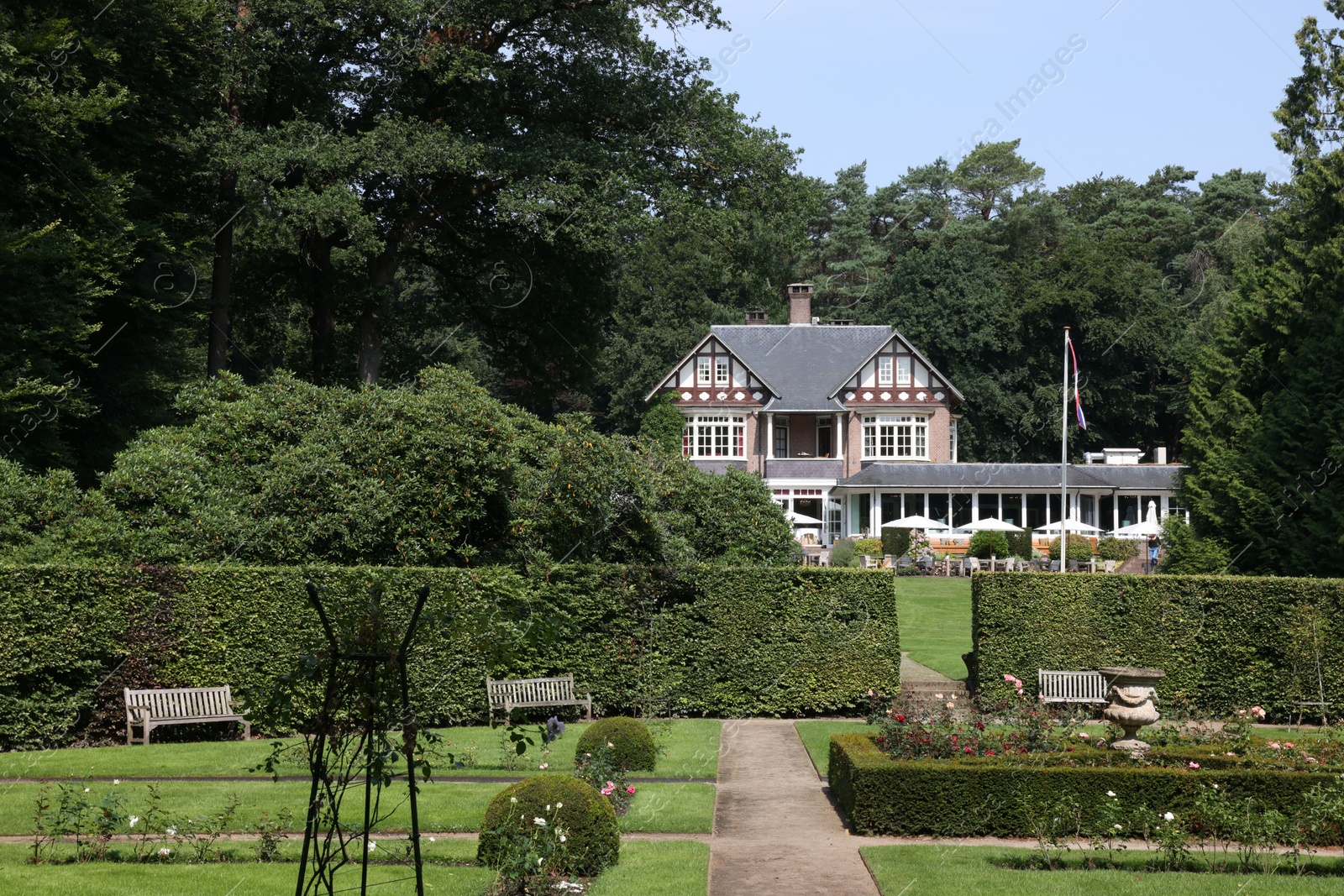 Photo of Ermelo, Netherlands - July 20, 2022: Luxury hotel Het Roode Koper and beautiful plants