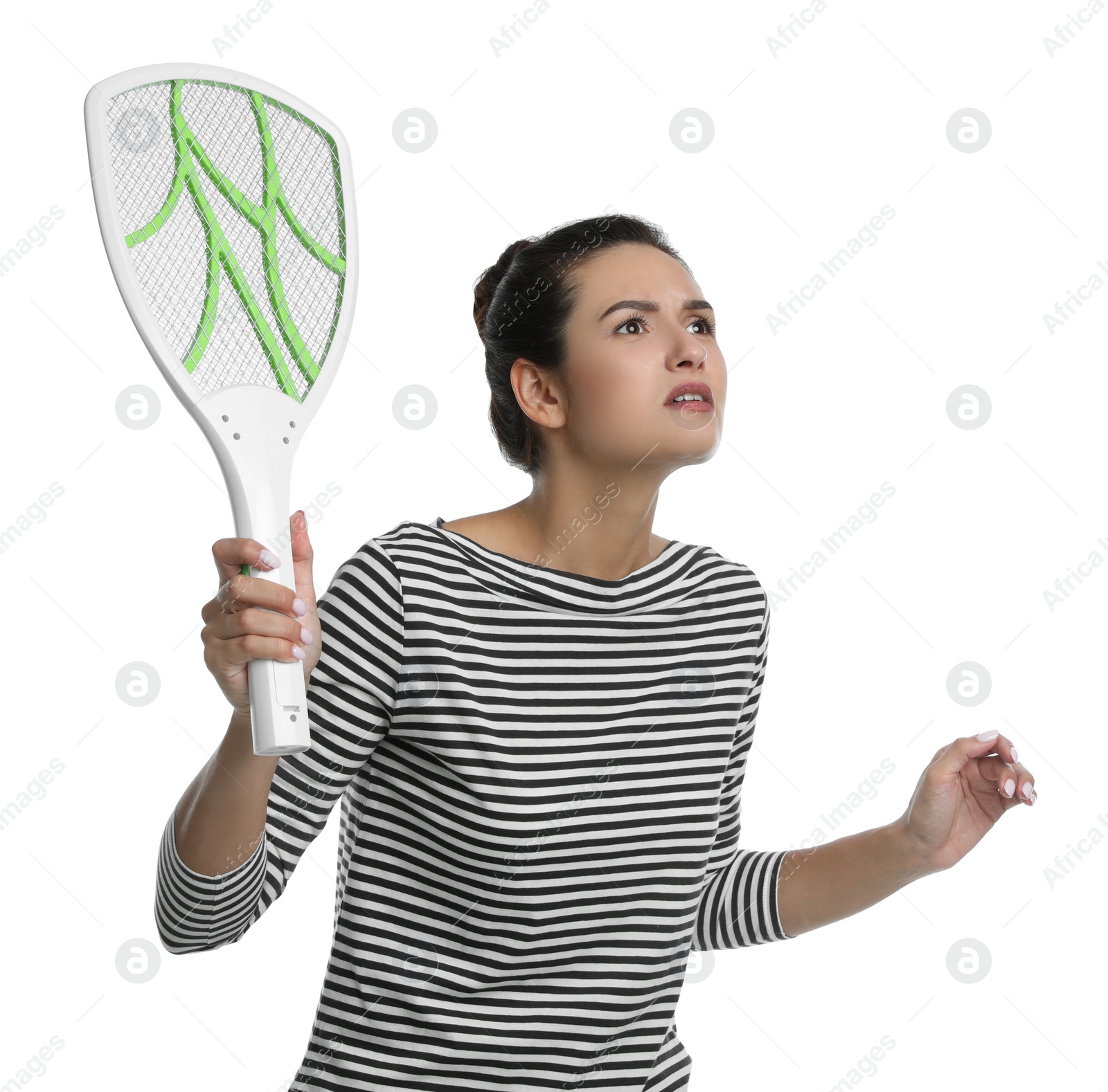 Photo of Young woman with electric fly swatter on white background. Insect killer