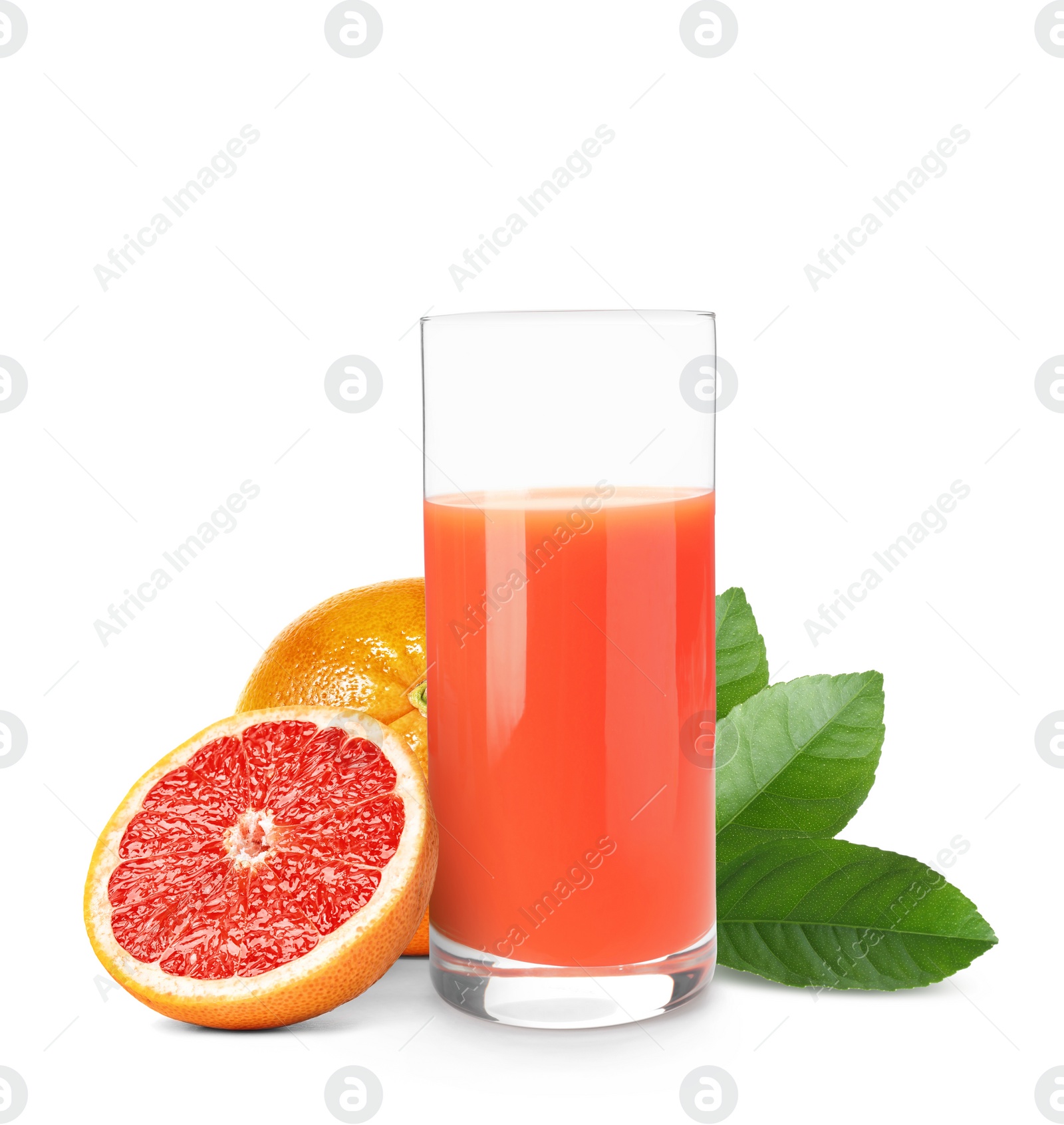 Image of Glass of grapefruit juice, fresh fruits and green leaves on white background