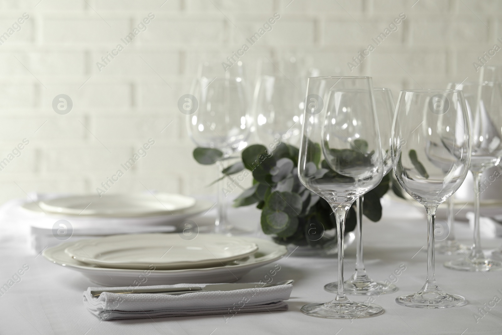Photo of Stylish elegant table setting in restaurant. Space for text