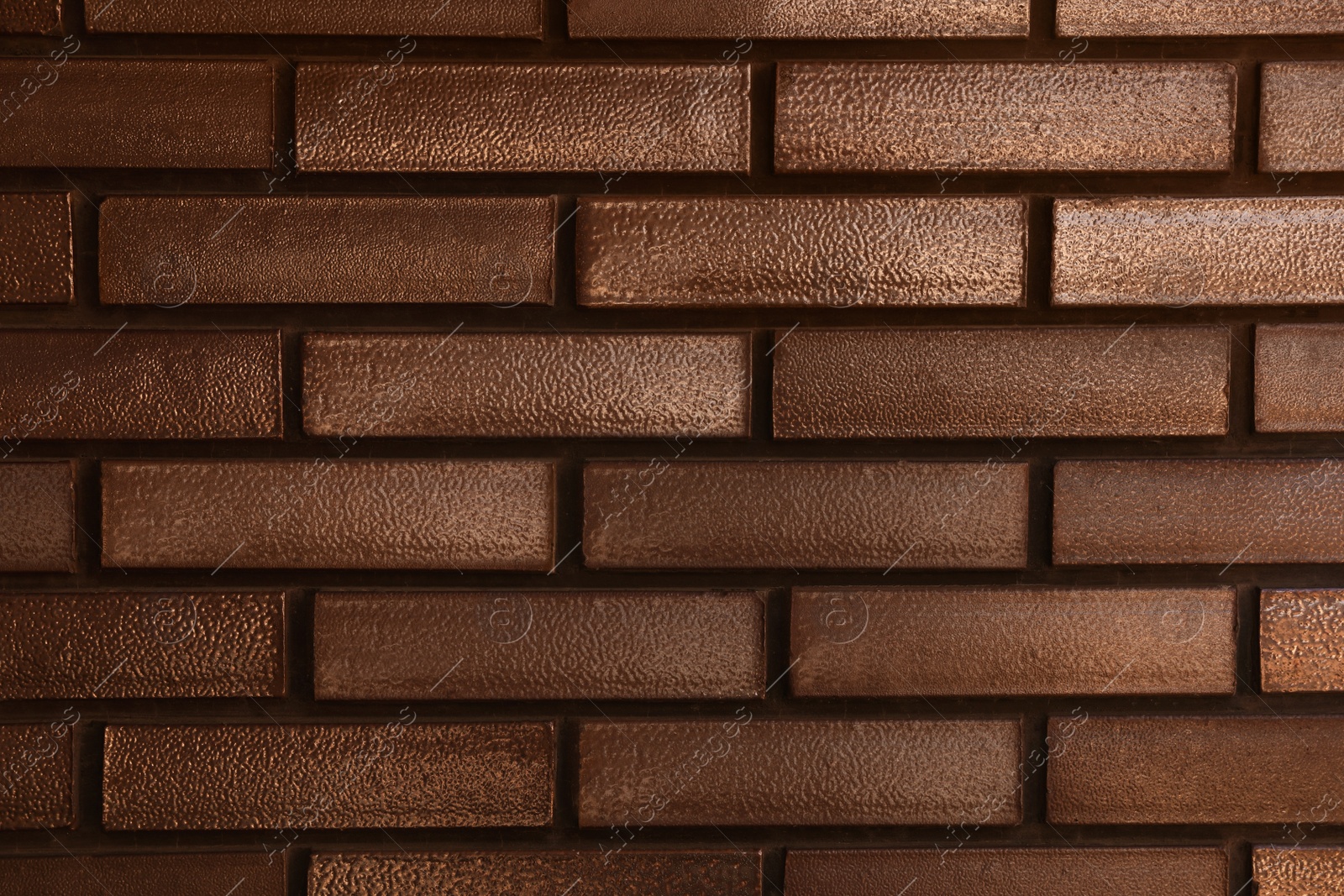 Photo of Texture of brown brick wall as background