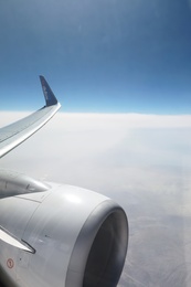 DUBAI, UNITED ARAB EMIRATES - NOVEMBER 06, 2018: Picturesque view of cloudy sky from Flydubai plane