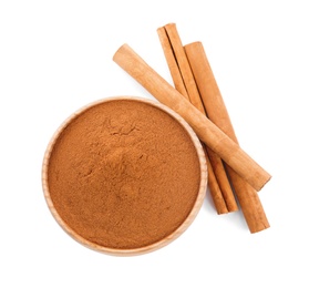 Photo of Aromatic cinnamon sticks and bowl with powder on white background, top view