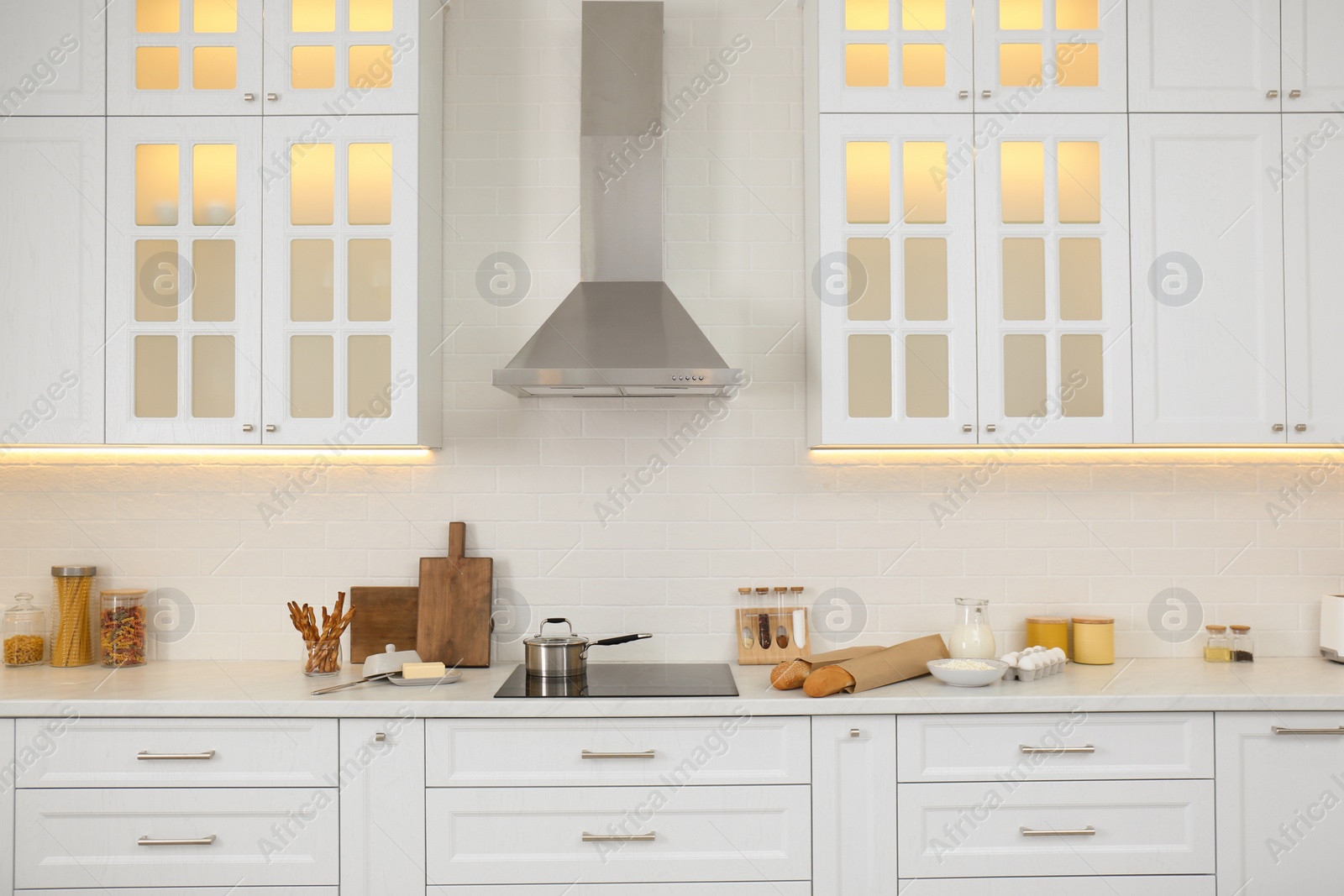 Photo of Beautiful kitchen interior with new stylish furniture