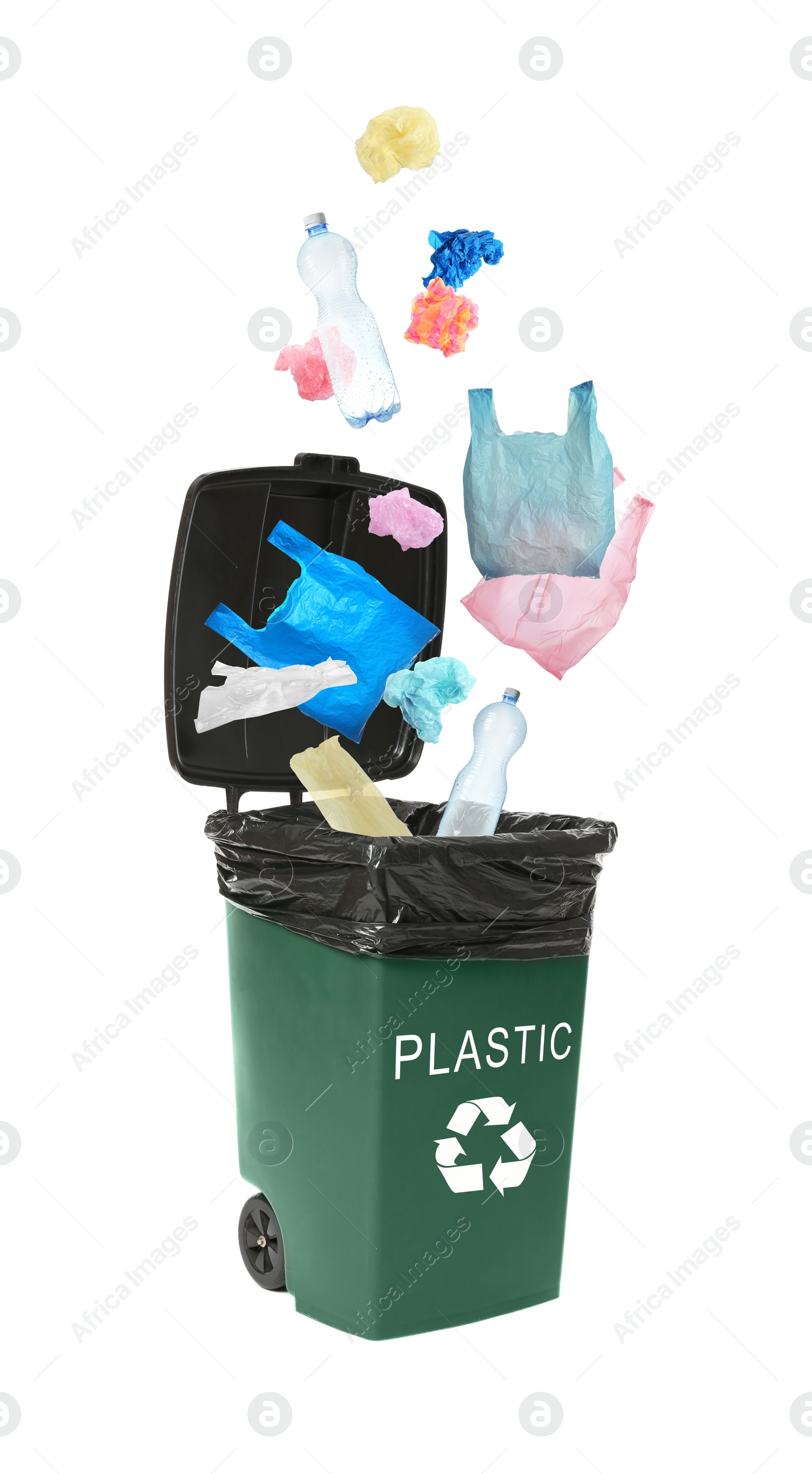 Image of Different plastic garbage falling into trash bin. Waste management and recycling