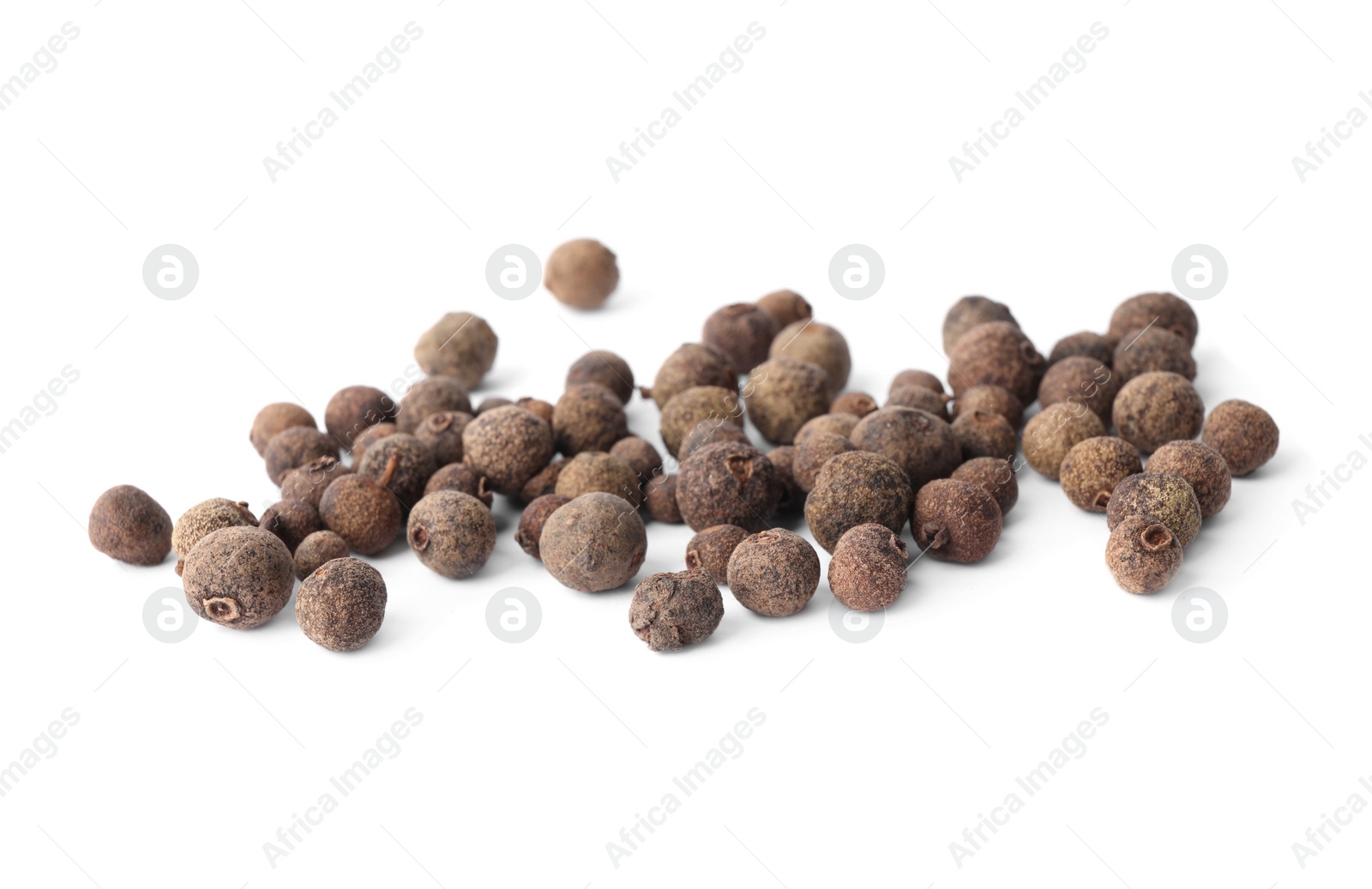Photo of Spicy black pepper grains isolated on white