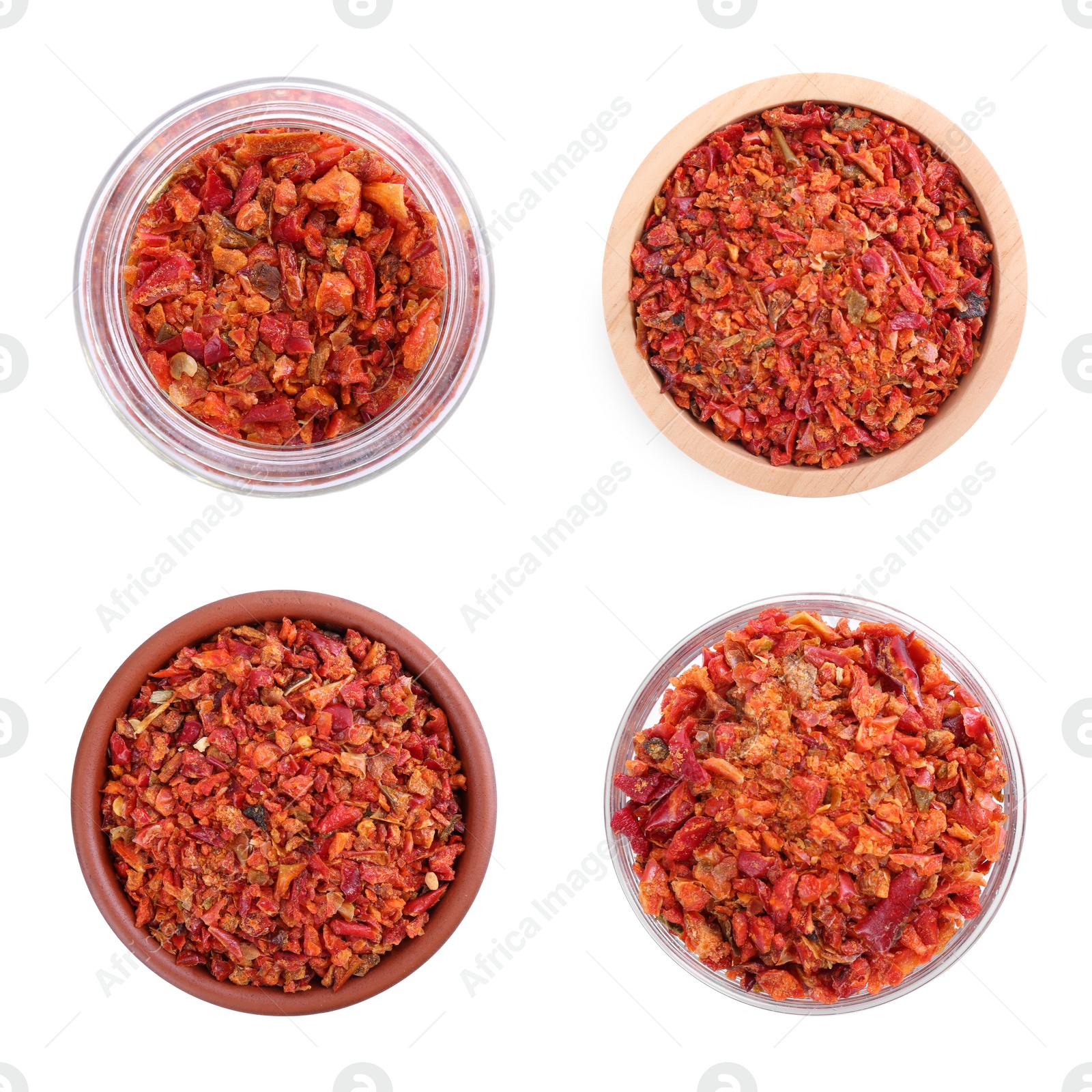 Image of Aromatic spices. Red chili pepper flakes in bowls and glass jar on white background, set