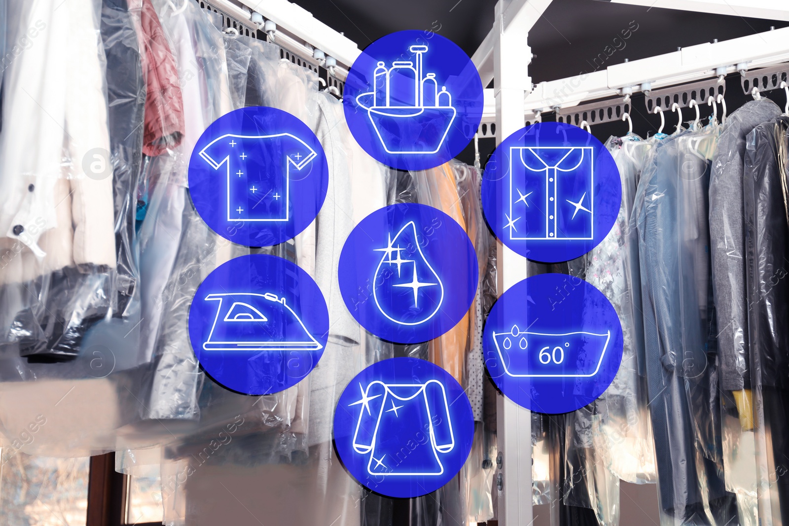 Image of Different icons and hangers with clothes on garment conveyor at dry-cleaner's