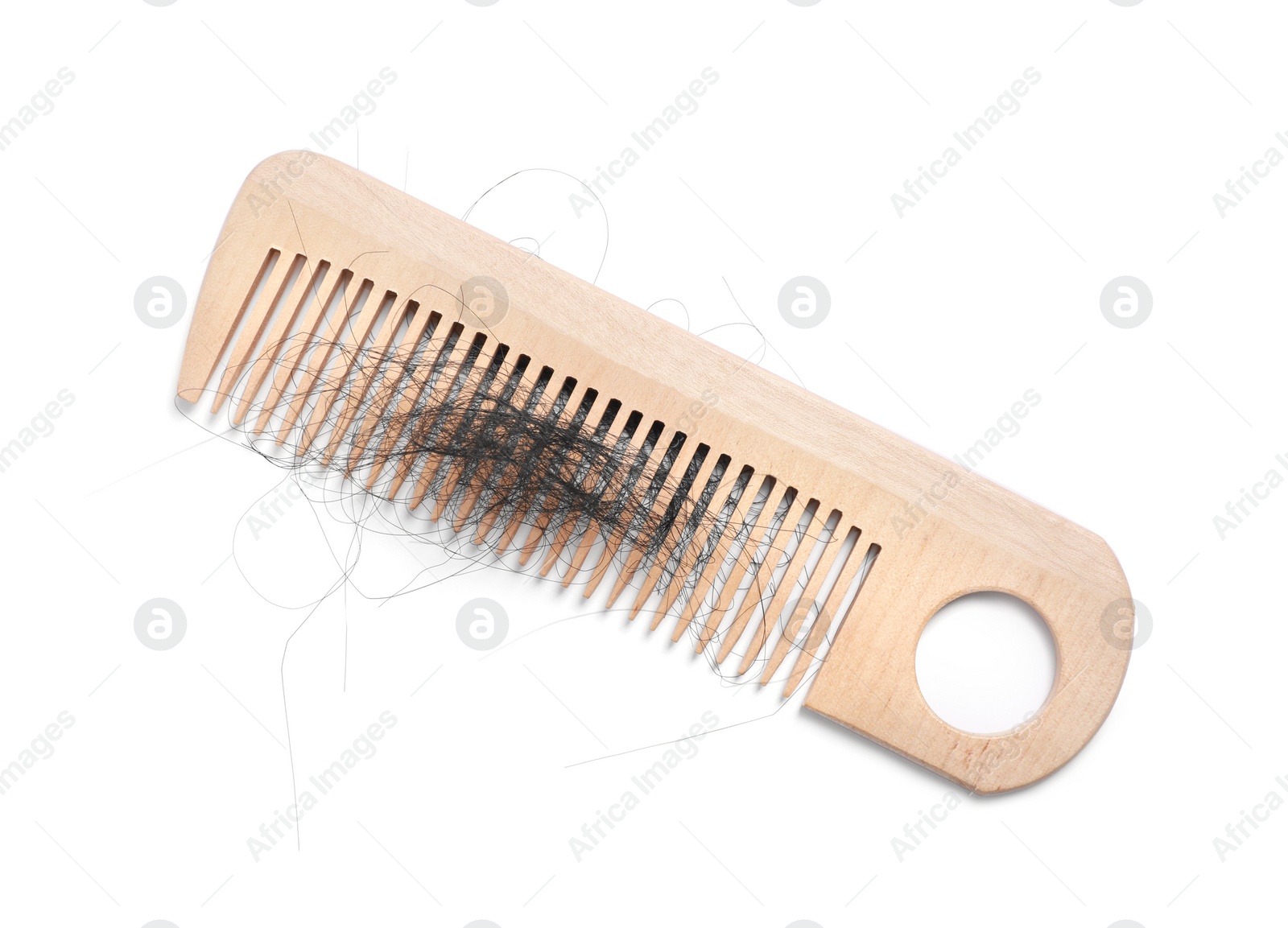 Photo of Wooden comb with lost hair on white background, top view