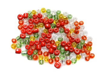 Photo of Pile of colorful beads on white background