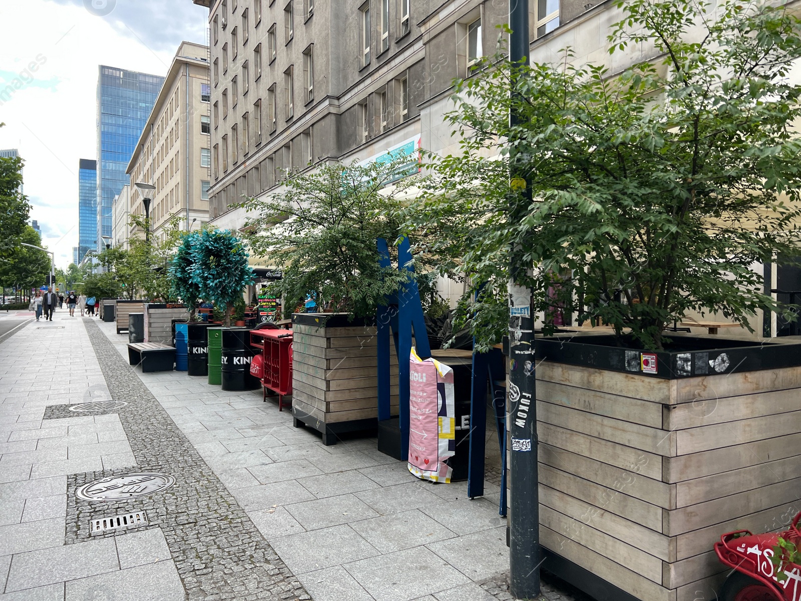 Photo of WARSAW, POLAND - JULY 17, 2022: Beautiful view of modern cafe with outdoor terrace