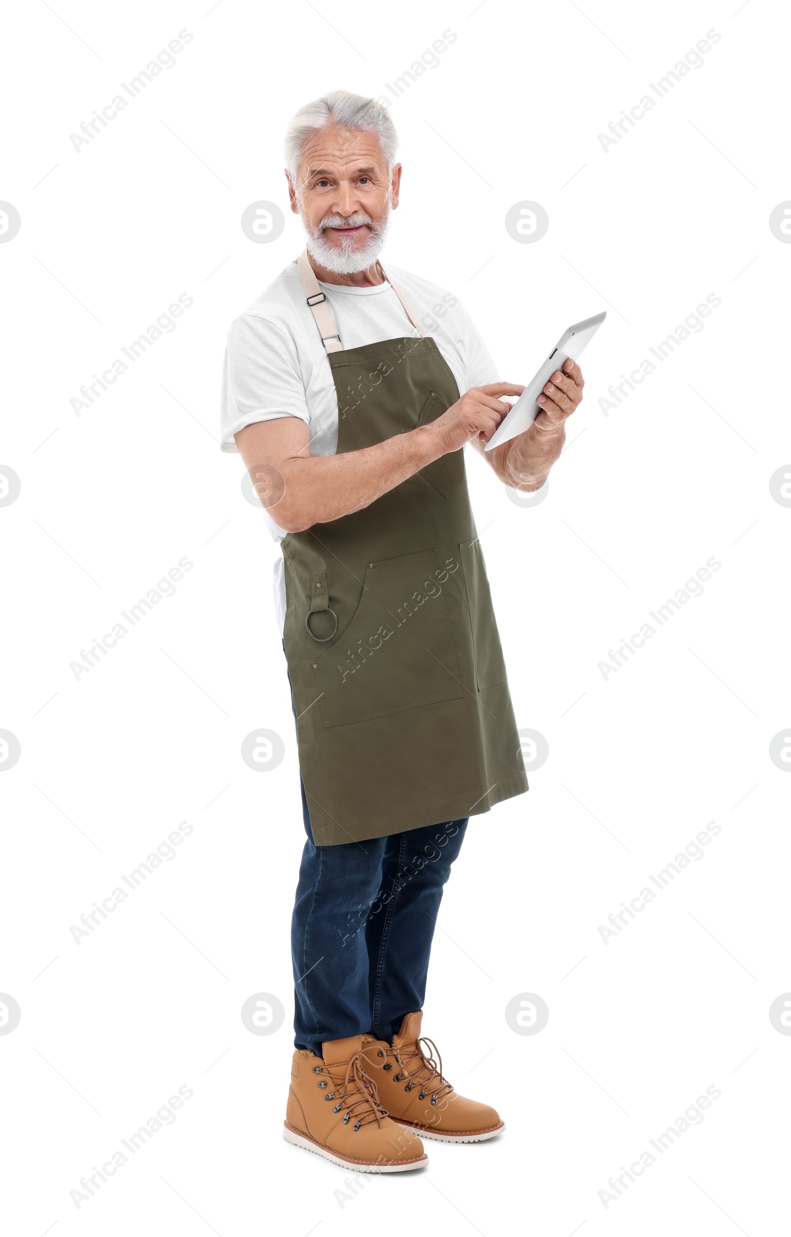 Photo of Senior man using tablet on white background