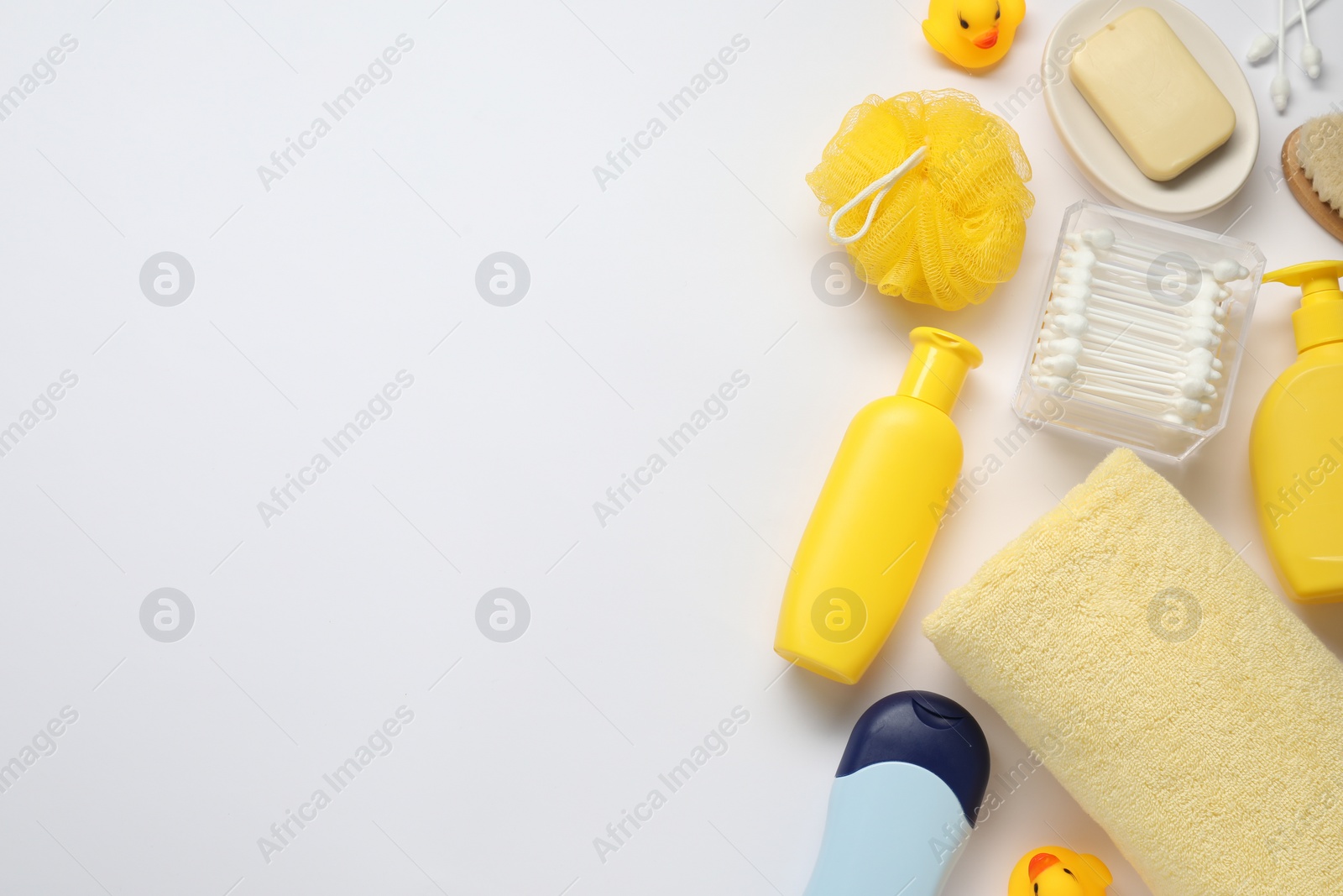 Photo of Baby bath accessories and care products on white background, flat lay. Space for text