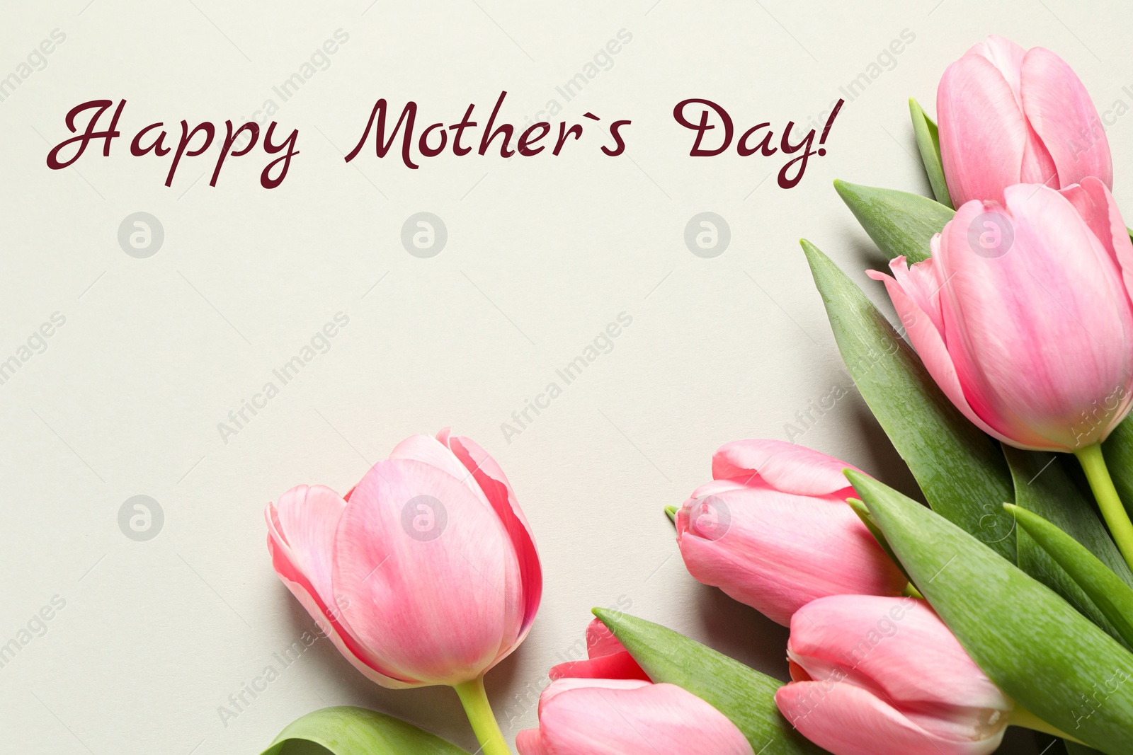 Image of Happy Mother's Day greeting card. Beautiful tulip flowers on beige background
