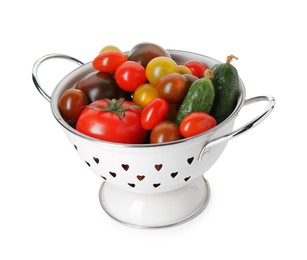 Photo of Metal colander with different tomatoes and cucumbers isolated on white