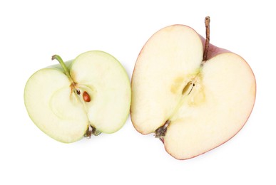 Photo of Pieces of ripe apples isolated on white, top view