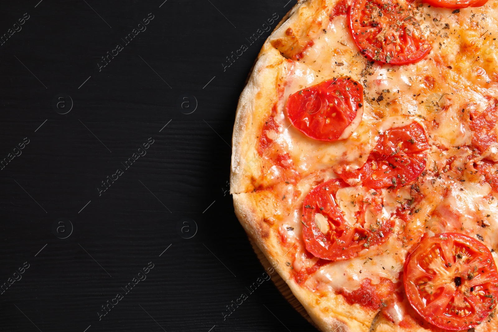 Photo of Hot cheese pizza Margherita on wooden table, top view. Space for text