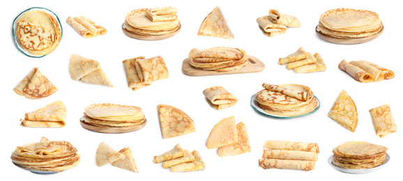 Image of Set of delicious thin pancakes on white background