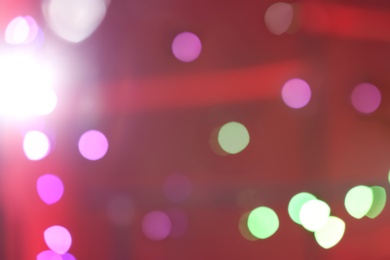 Blurred view of beautiful festive lights. Bokeh effect