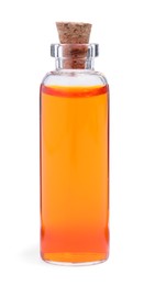 Photo of Glass bottle of orange food coloring on white background