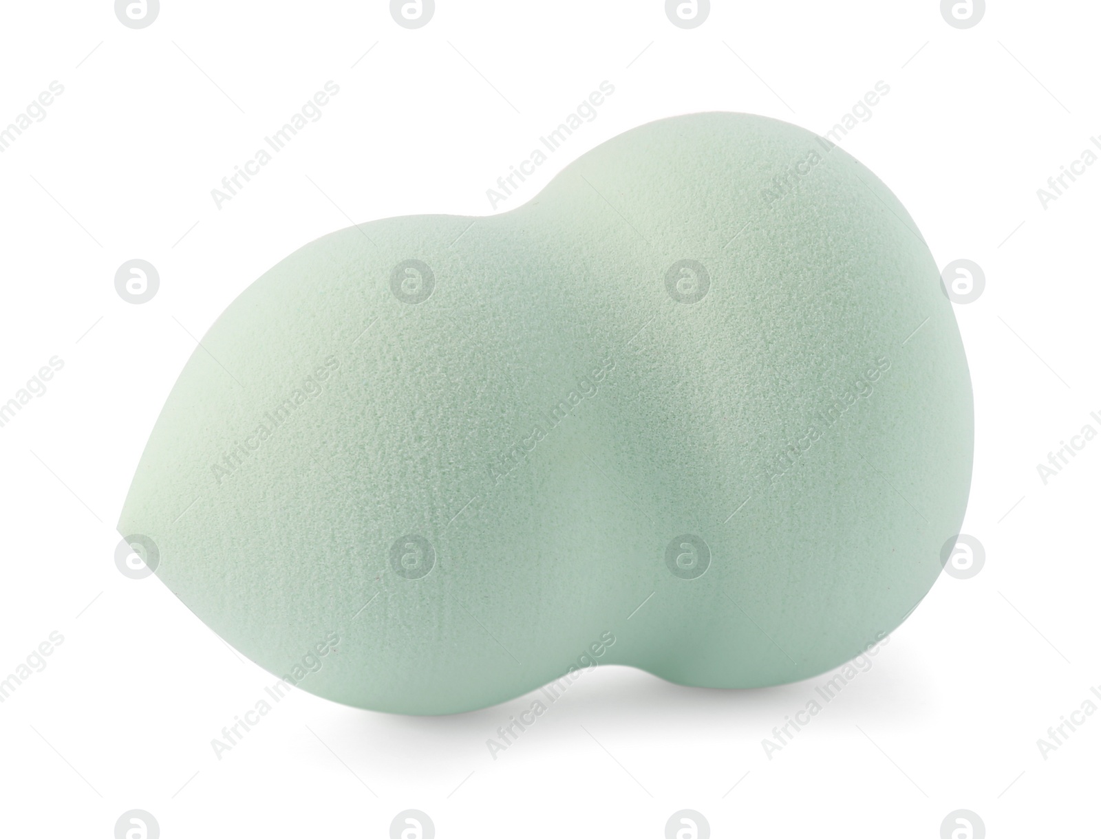 Photo of Light green makeup sponge isolated on white