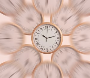 Many clocks on beige background, motion blur effect. Time concept