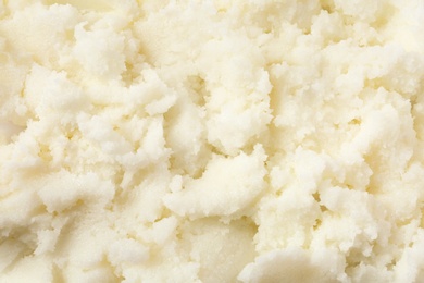 Photo of Fresh shea butter as background, top view. Cosmetic product