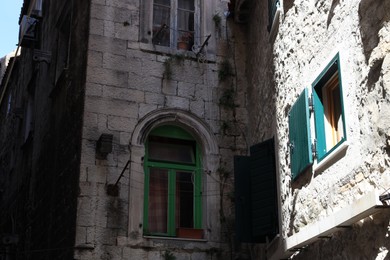 View of old residential building with color windows