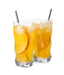 Photo of Delicious orange soda water on white background