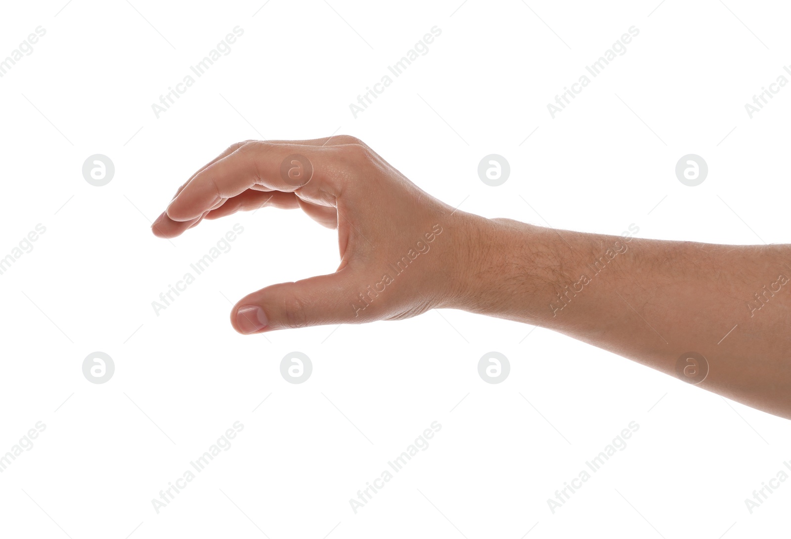 Photo of Man holding something against white background, closeup of hand