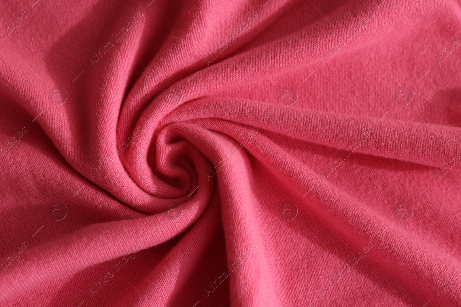 Photo of Beautiful pink fabric as background, top view