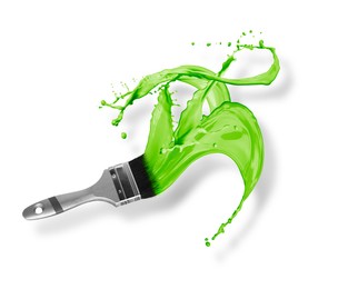 Image of Brush and splashing green paint on white background