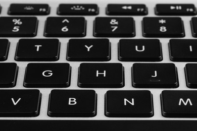 Photo of Closeup view of buttons on modern computer keyboard