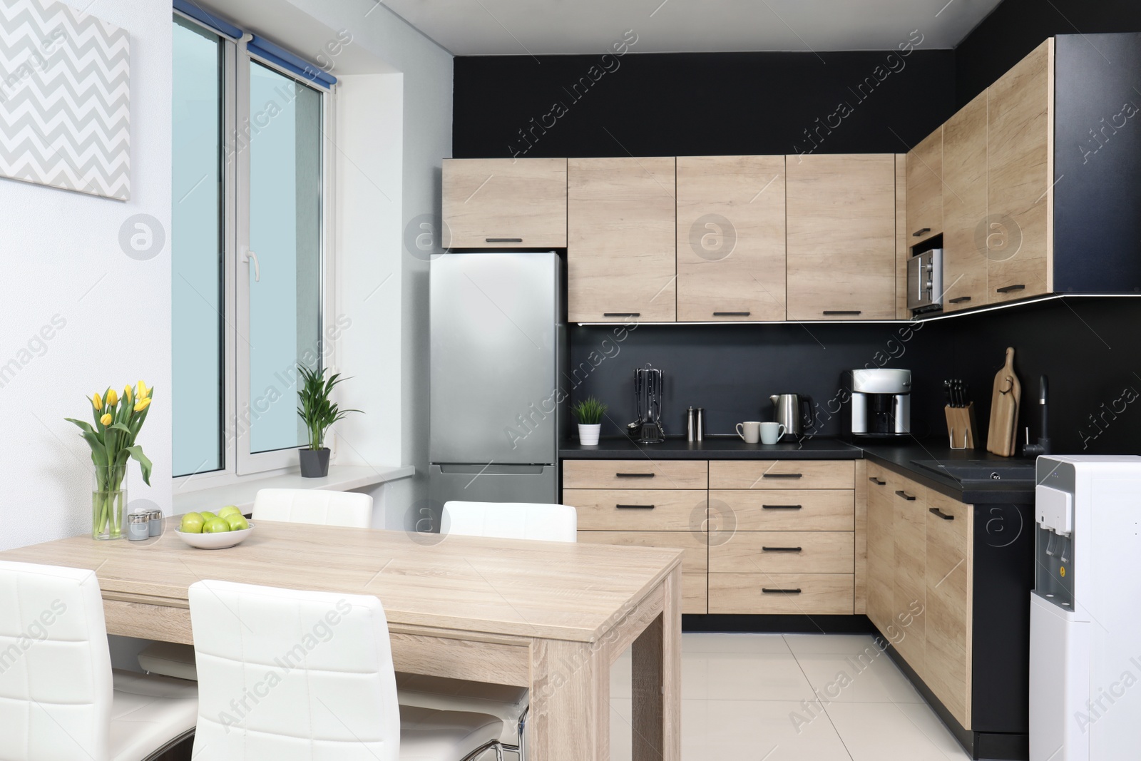 Photo of Cozy modern kitchen interior with new furniture and appliances