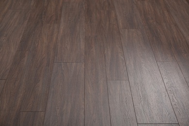 Clean wooden laminate as background. Floor covering