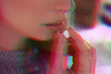 Psychedelic hallucinations. Woman taking pill, closeup. Glitch effect