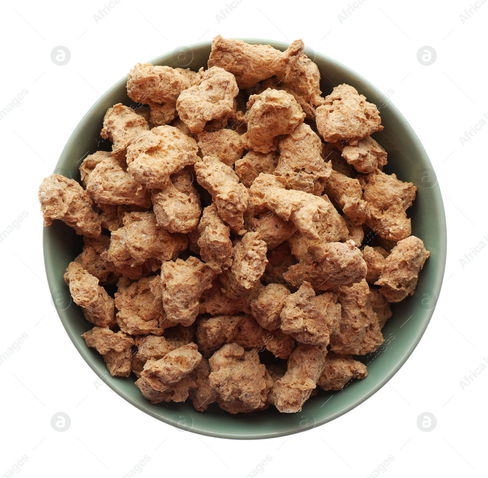 Photo of Dehydrated soy meat chunks in bowl on white background, top view