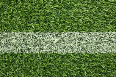 Image of Green grass with white marking, top view